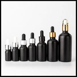China Cosmético helado negro de las botellas de cristal del aceite esencial del color que empaqueta forma redonda proveedor