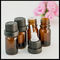 botellas de cristal del aceite esencial de 10ml Brown con el enchufe interno del hurto de la cabeza anti del negro proveedor